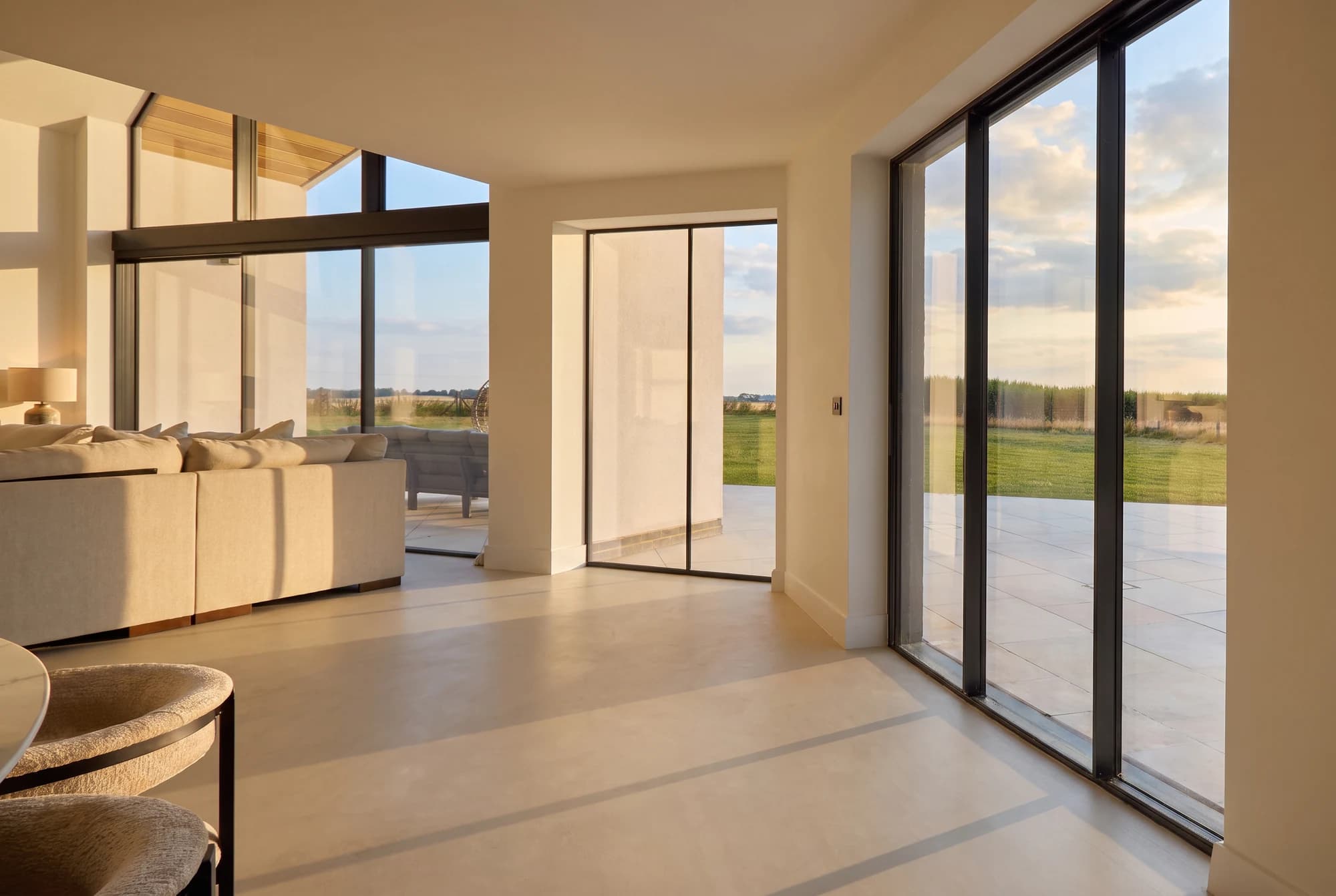 Living space with floor-to-ceiling glazing and countryside views